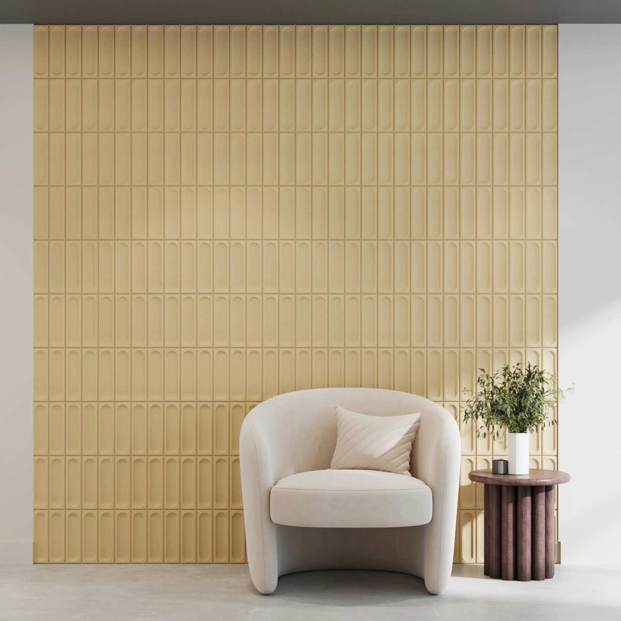 Modern armchair in a room with a textured yellow wall and small round table.