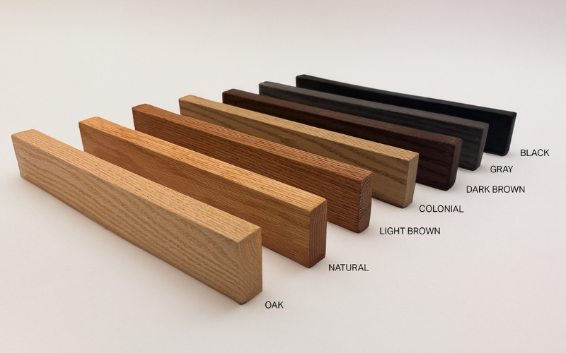 Wooden handles in various finishes on a white background