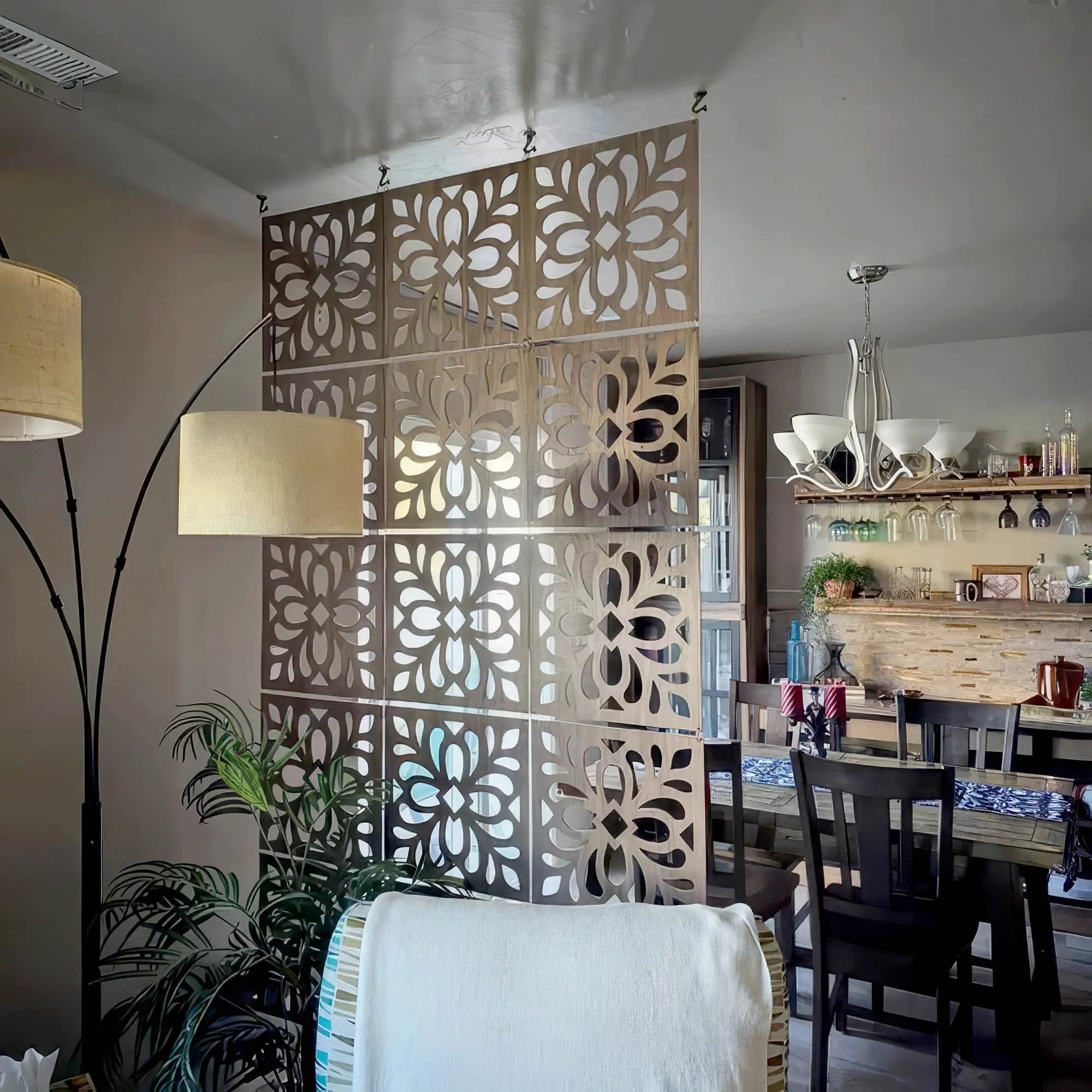 Decorative wall panel with floral patterns in a living room setting.