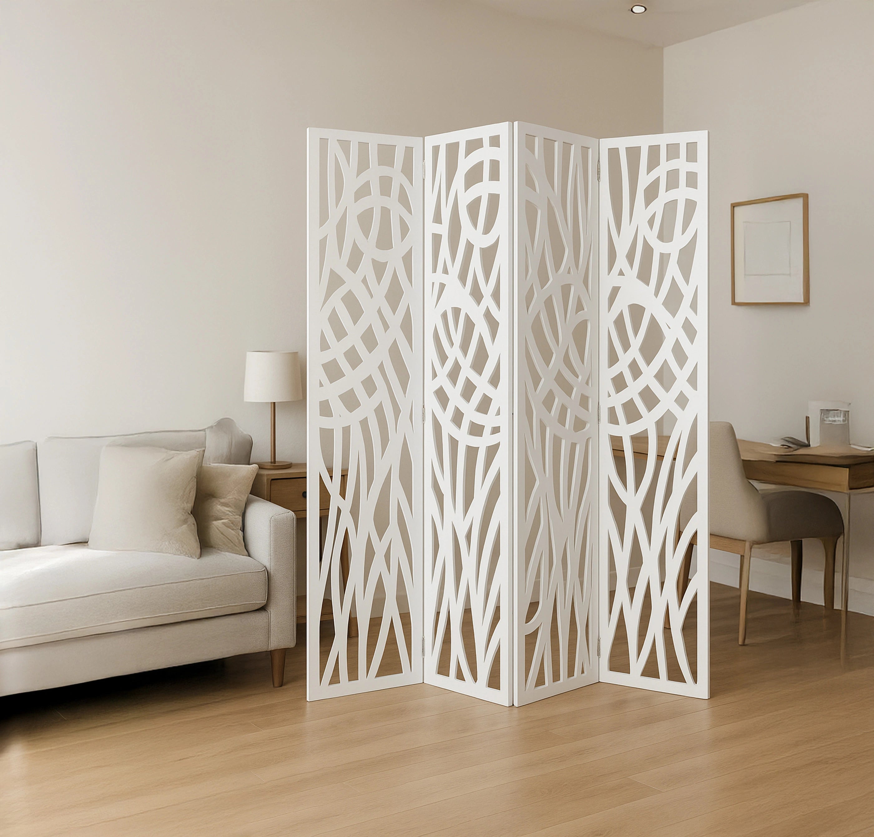 White lattice room divider in a living room setting with a couch and desk.
