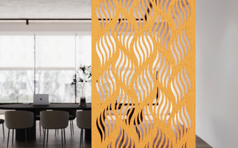 Yellow decorative screen with wavy pattern in a modern room setting